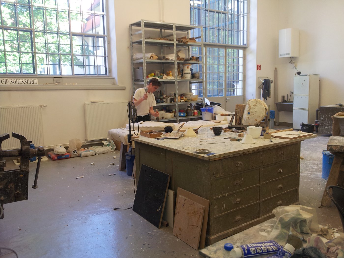 View into the workshop with a working student