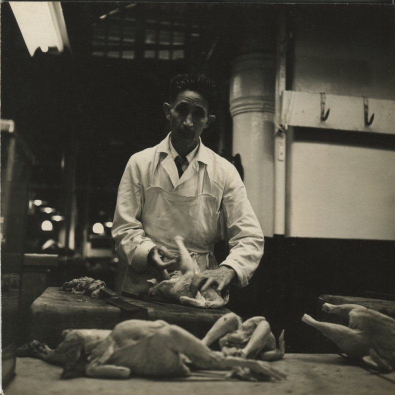 Gu Shuxing, [em]A Butcher[/em], late 1930s or late 1940s, New York. Gelatin silver print, 16 x 16 cm. Courtesy of Tong Yuqiong