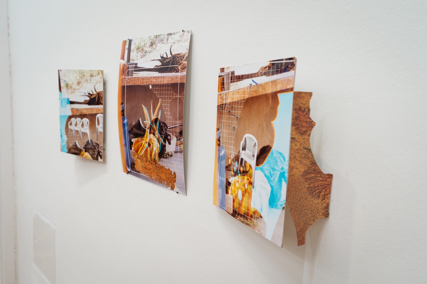 Three Collages on a white wall