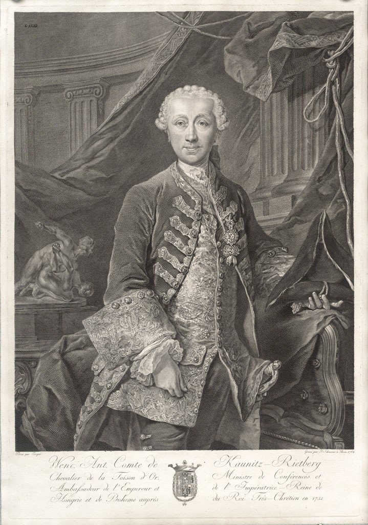 The copper engraving shows the portrait of the standing, nobly dressed State Chancellor Wenzel Anton Prince Kaunitz-Rietberg. He wears a lavishly ornamented jacket and velvet trousers under a richly embroidered collarless coat jacket with large wide cuffs. The frilled collar, a so-called jabot, is tucked into his jacket. On his head he wears a white wig with a centre parting and tight curls at the sides. In his right hand he holds a three-pointed hat sticking upwards. The prince stands in front of a semi-circular wall decorated with antique pilasters and cornices. The largest part of the background is taken up by a broad swathe of fabric. At the bottom of the picture is an inscription extended over four lines, divided in the middle by an emblem. The writing is fine and curved, but too small to read.