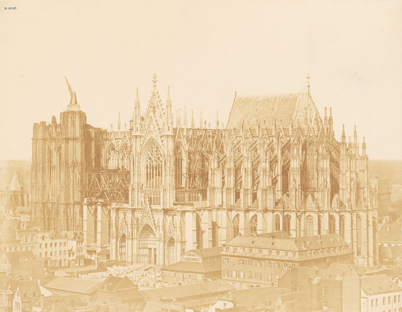 Photograph of the Cologne Cathedral under construction, still without the towers of the west façade.