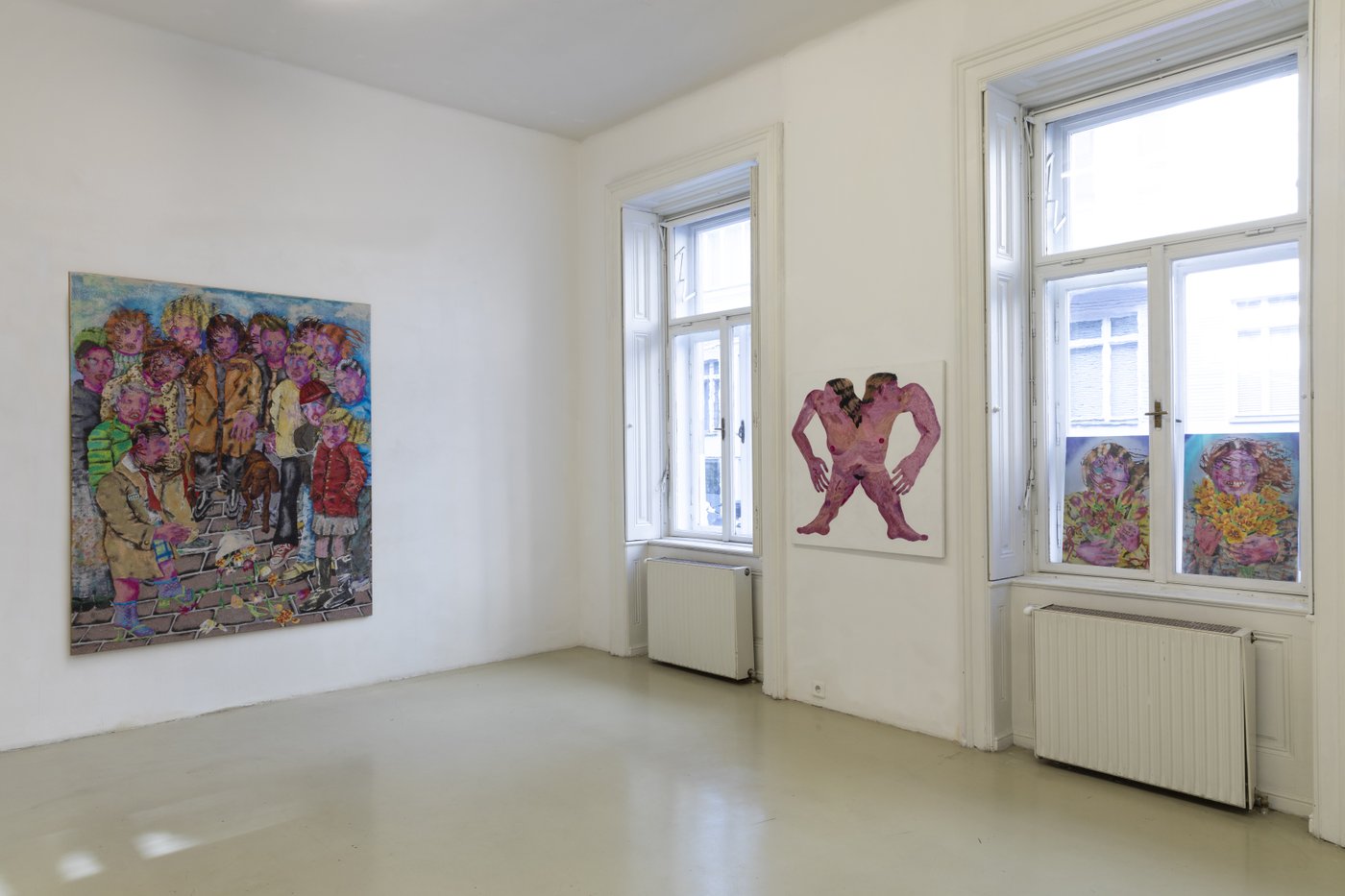 exhibition view with a painting and sculpture in front a window