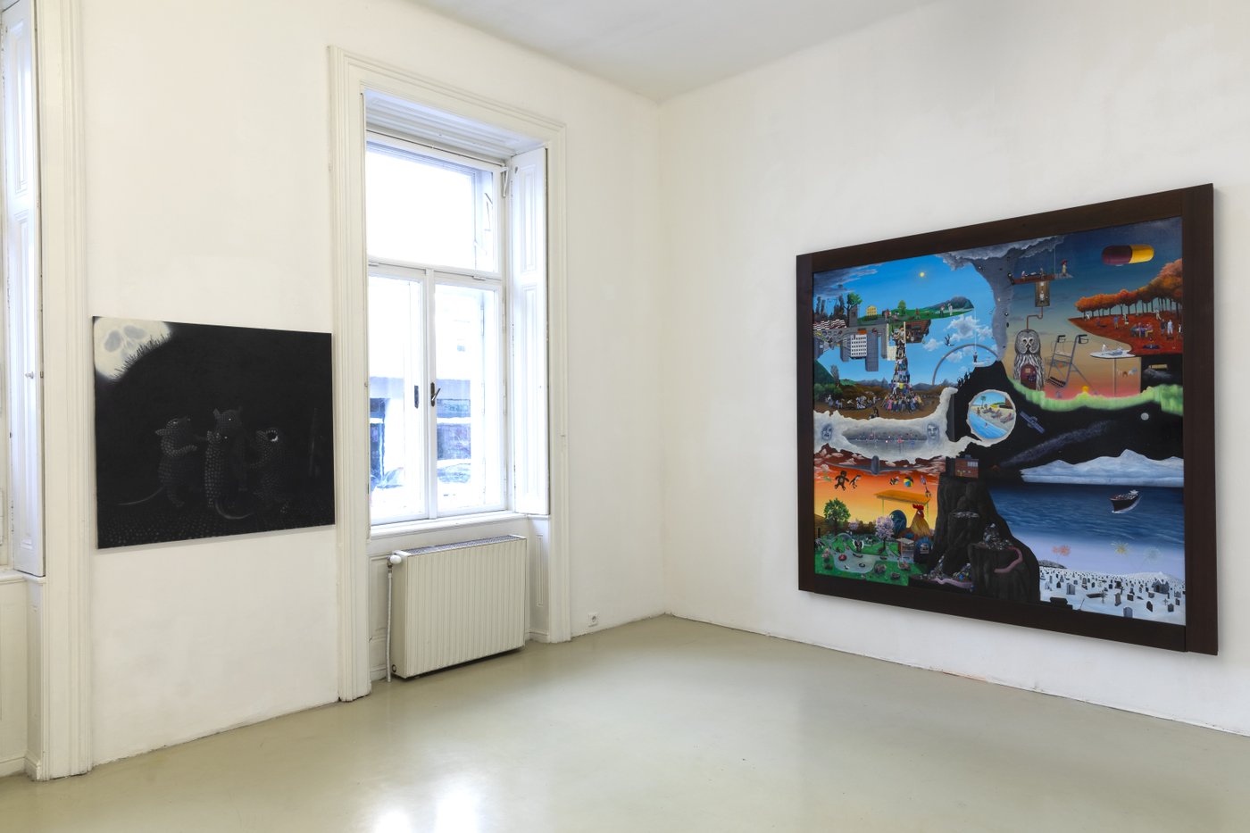 exhibition view with painting in front of a window