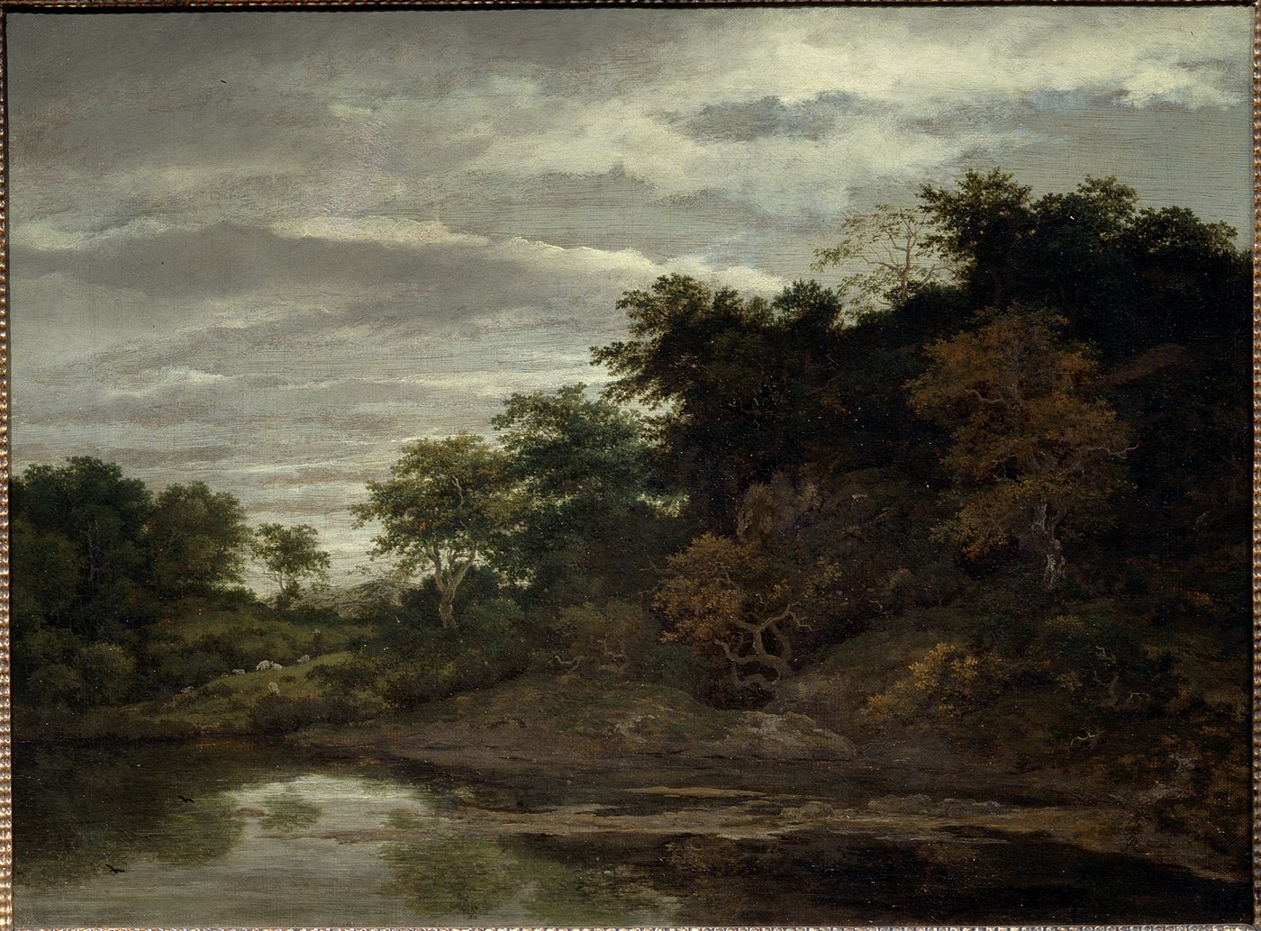 Landscape painting with cloudy sky and a forest landscape near a pond or river and a field where white sheep are grazing.