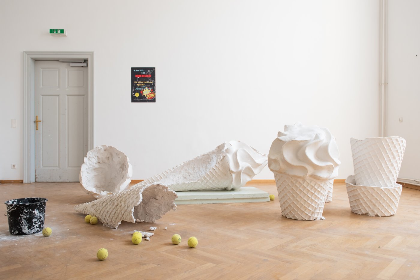 huge white ice cream cones on the floor