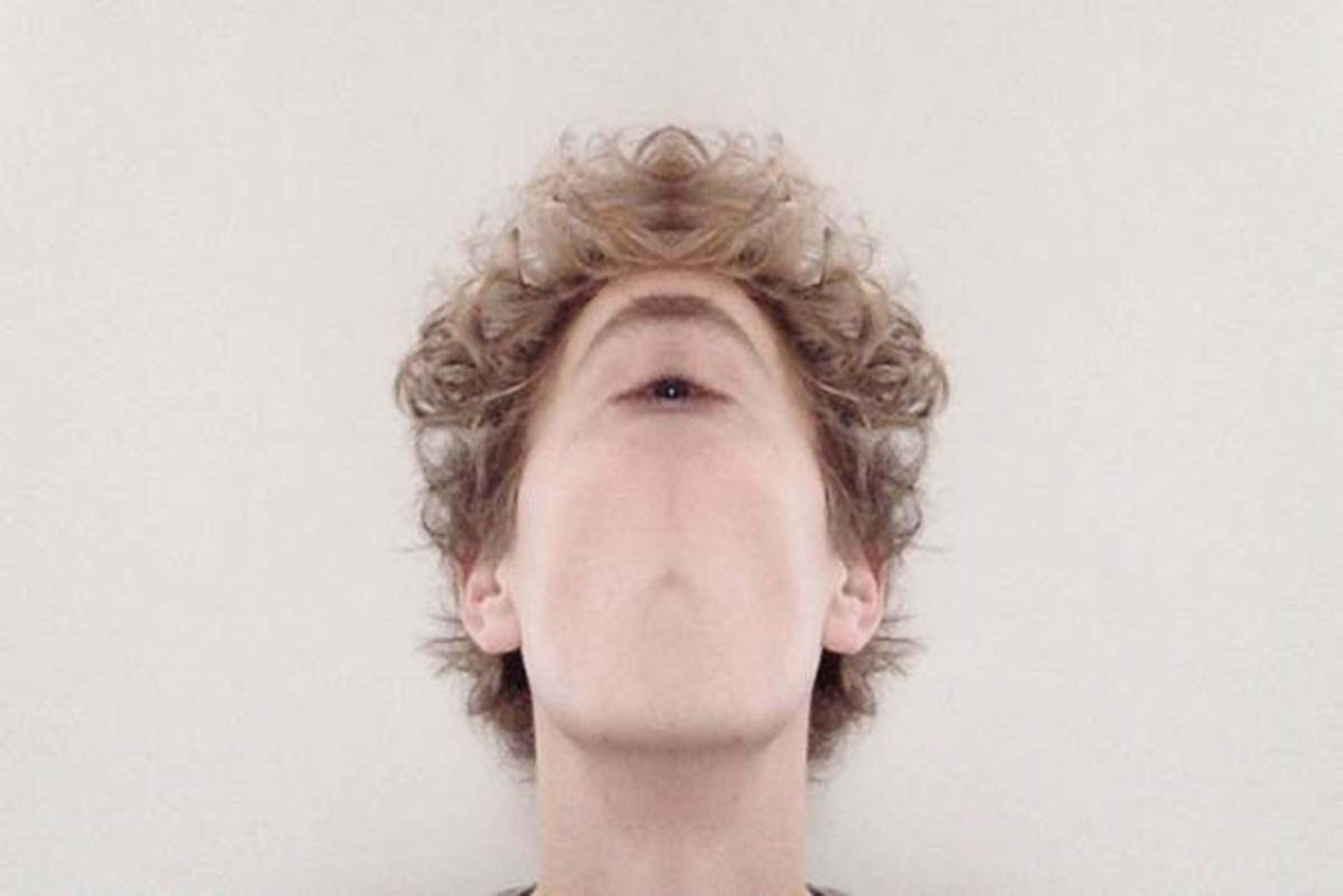 digitally edited face with one eye