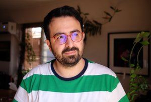 A portrait photo of Taha Ghanimi Fard.