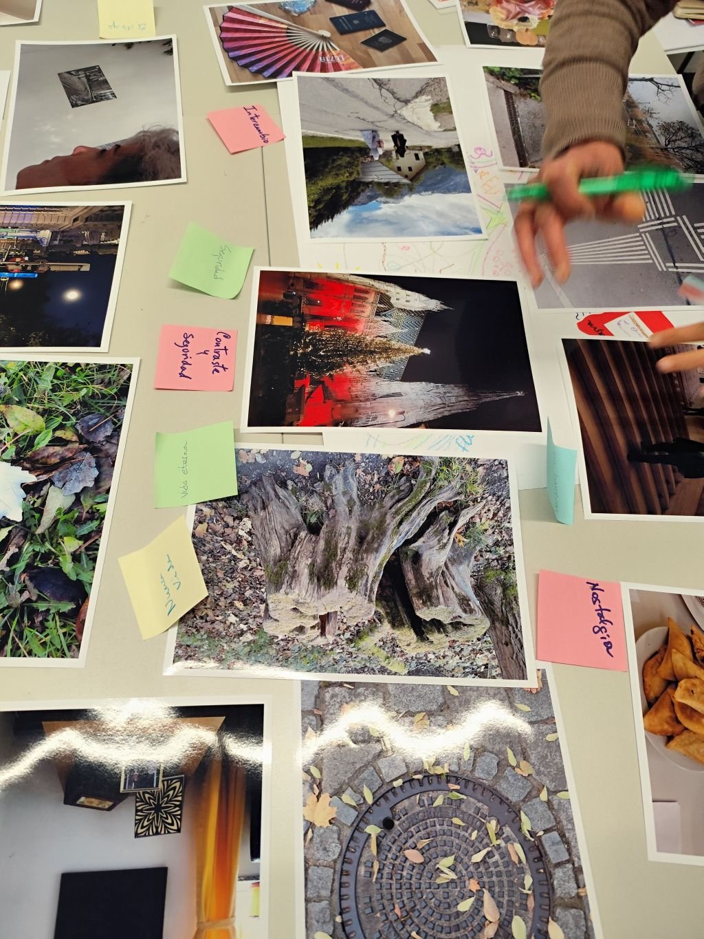 Pictures on a table with post-it's