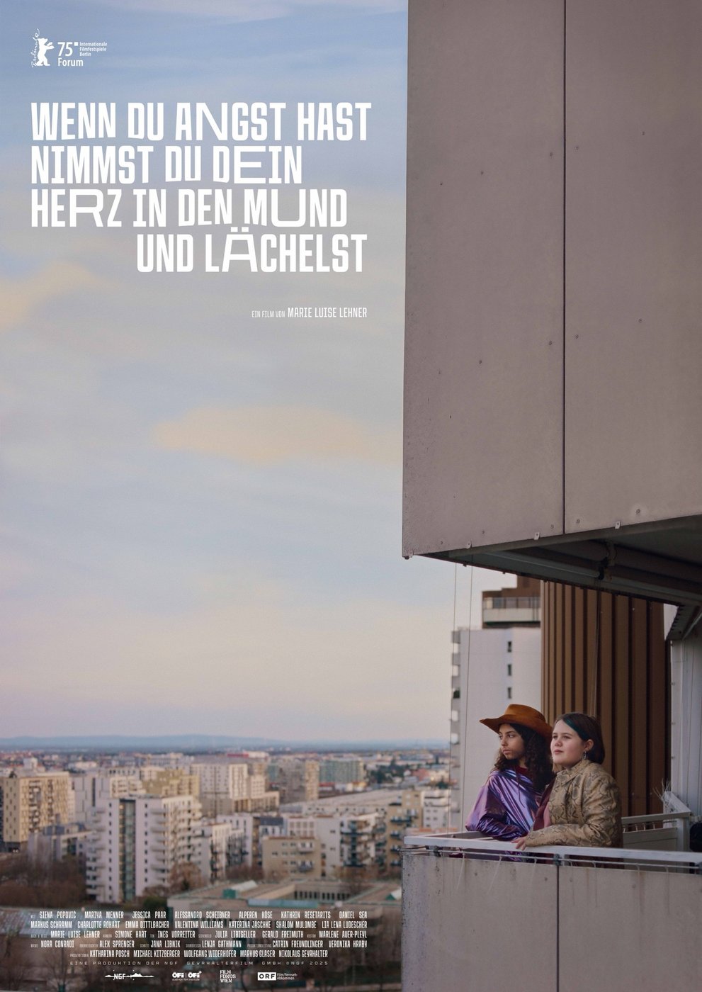 Motif of the movie poster. Two teenagers stand on the balcony of a high-rise apartment building and look out over the city