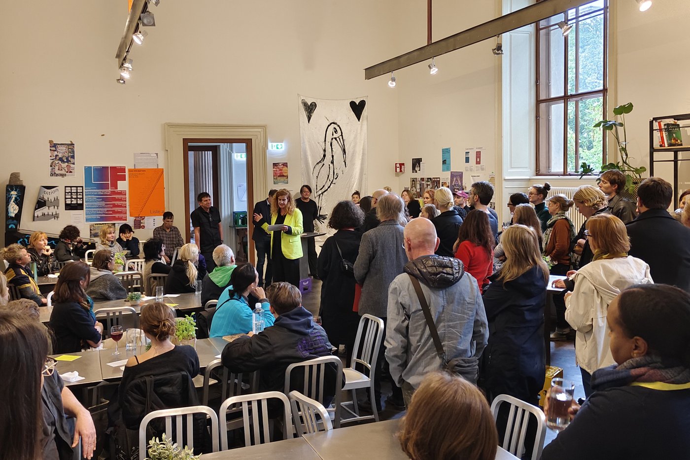 Picture of many people in the Mensa of the Academy listening to the speech of the vice rector