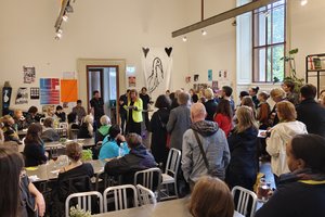 Picture of many people in the Mensa of the Academy listening to the speech of the vice rector